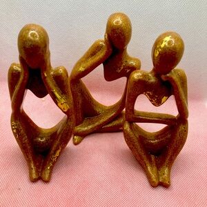 Resin and sand sculptures.